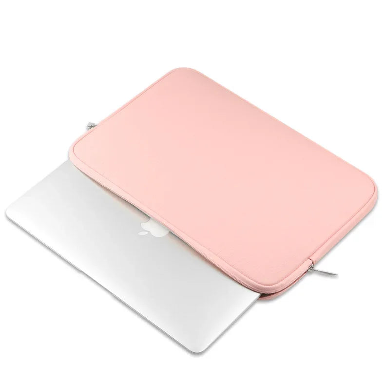 Housse rose avec un macbook a l'interieur