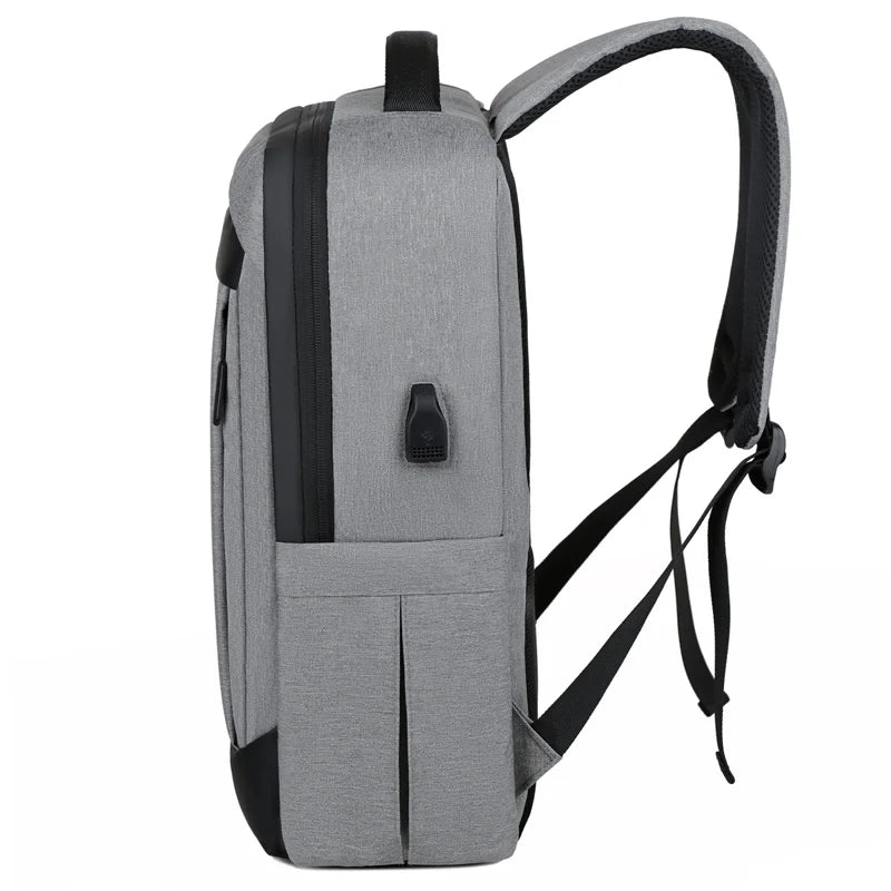 Sac à dos pour ordinateur gris vue de profil