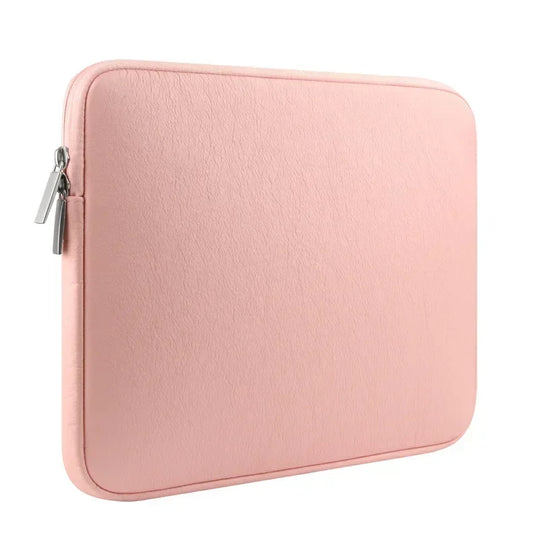 Un housse pour ordinateur rose 