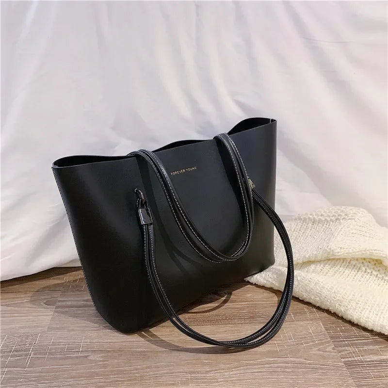 Sac ordinateur noir pour femme luxueux 